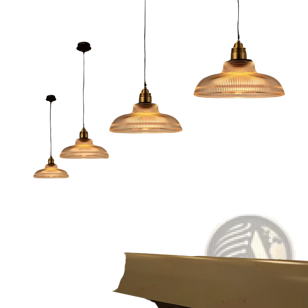Warm-toned ribbed glass pendant lights with brass metal fixtures hanging from the ceiling for stylish lighting