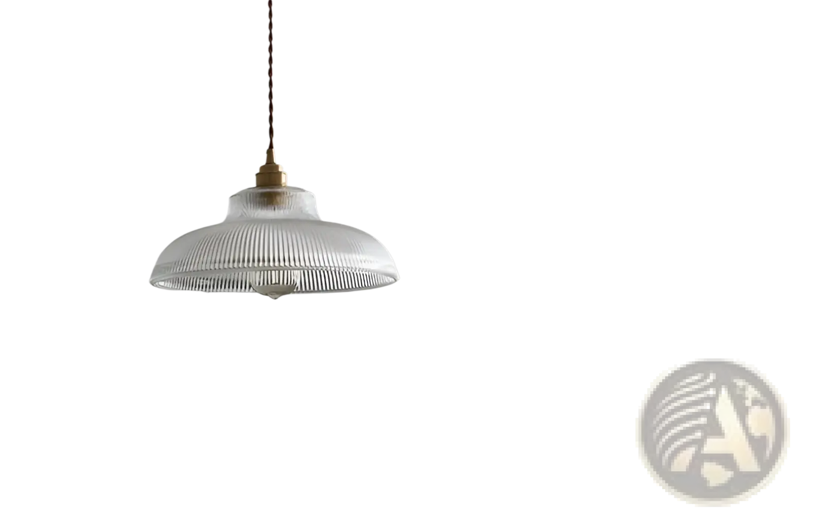 Ribbed glass pendant light with clear glass shade brass metal fixture and braided cord for indoor lighting