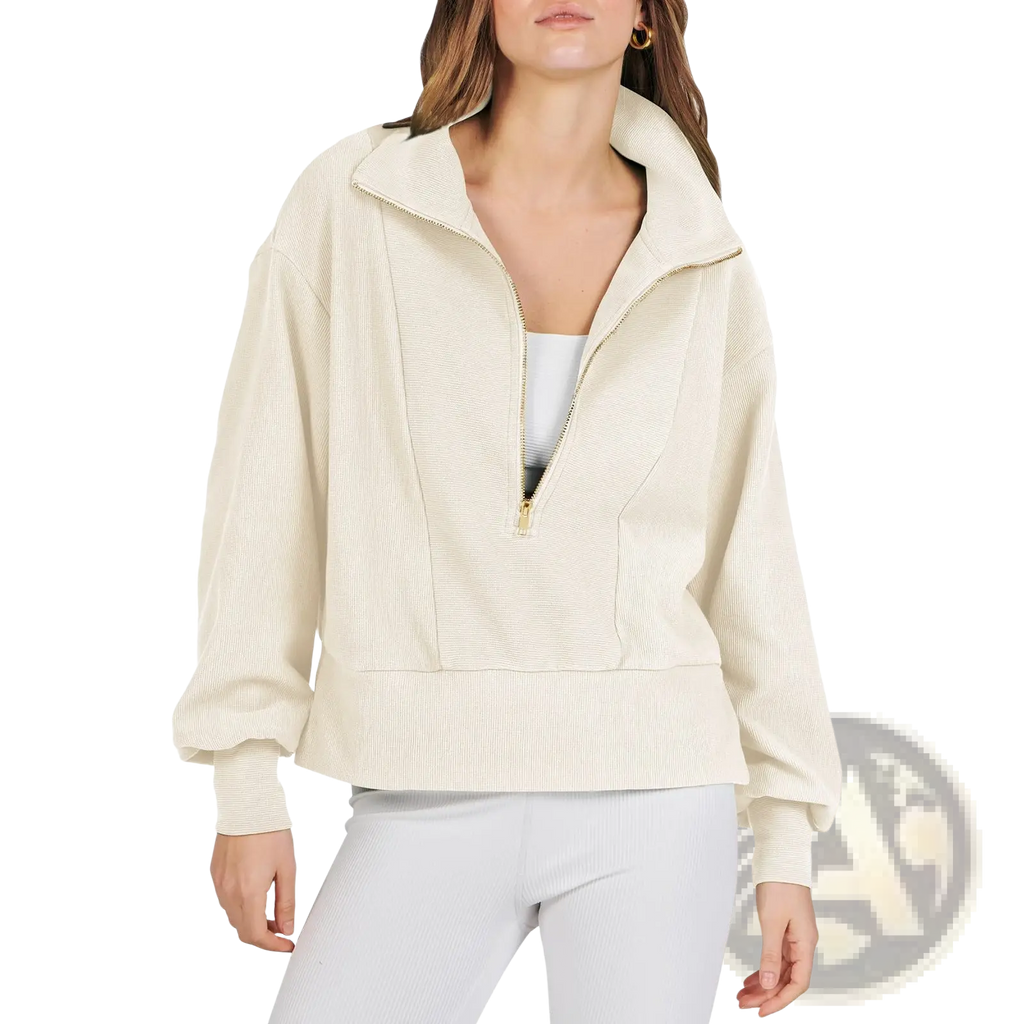 Cream-colored ribbed knit half-zip pullover sweatshirt with high collar and gold-toned zipper accents