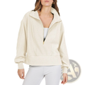 Cream-colored ribbed knit half-zip pullover sweatshirt with high collar and gold-toned zipper accents