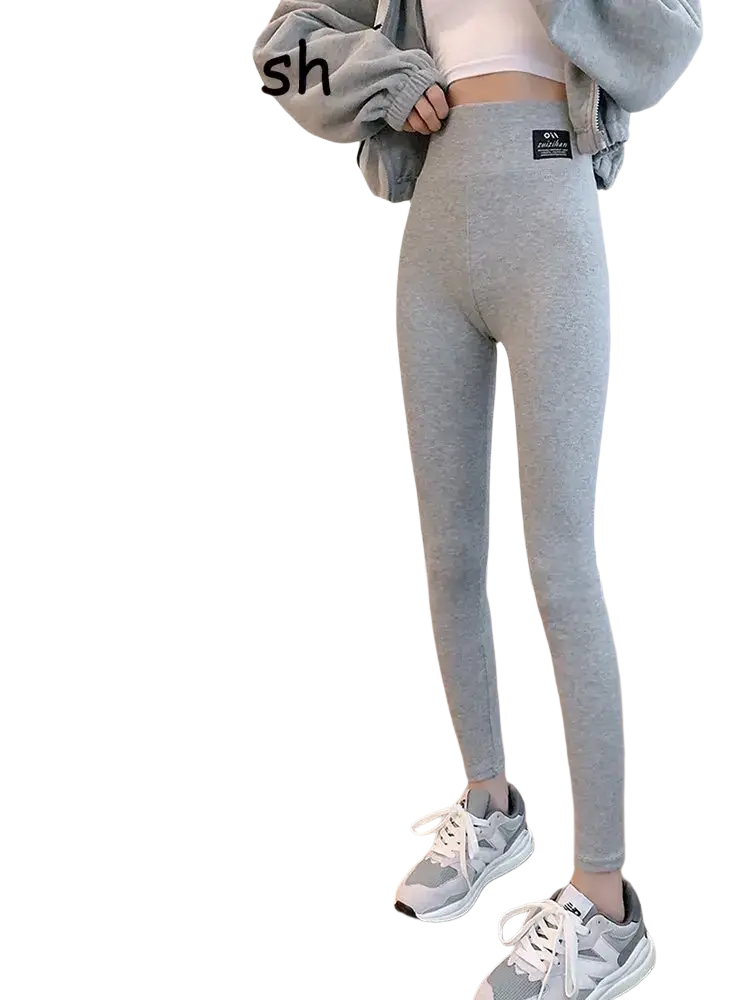 Gray heathered ribbed high waist workout leggings with a snug form-fitting design for activewear use