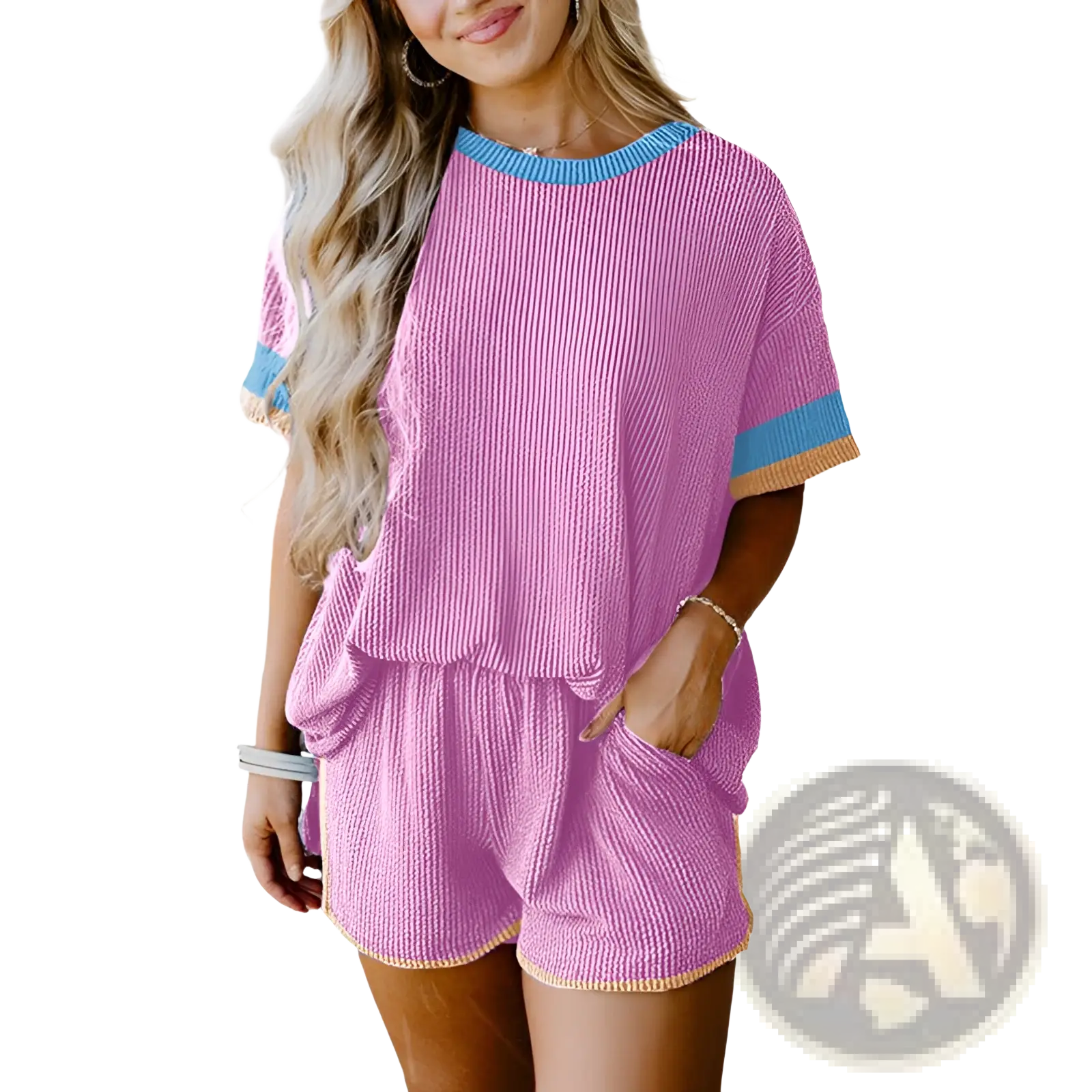 Pink ribbed knit two-piece lounge set with blue and beige contrast trim on neckline sleeves and hem