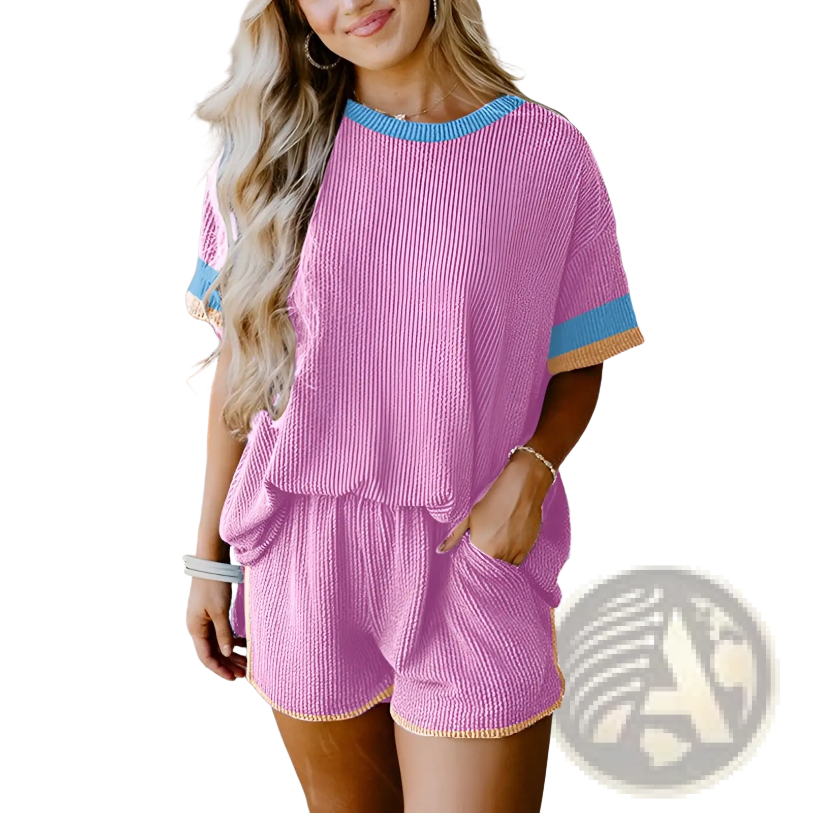 Pink ribbed knit two-piece lounge set with blue and beige contrast trim on neckline sleeves and hem