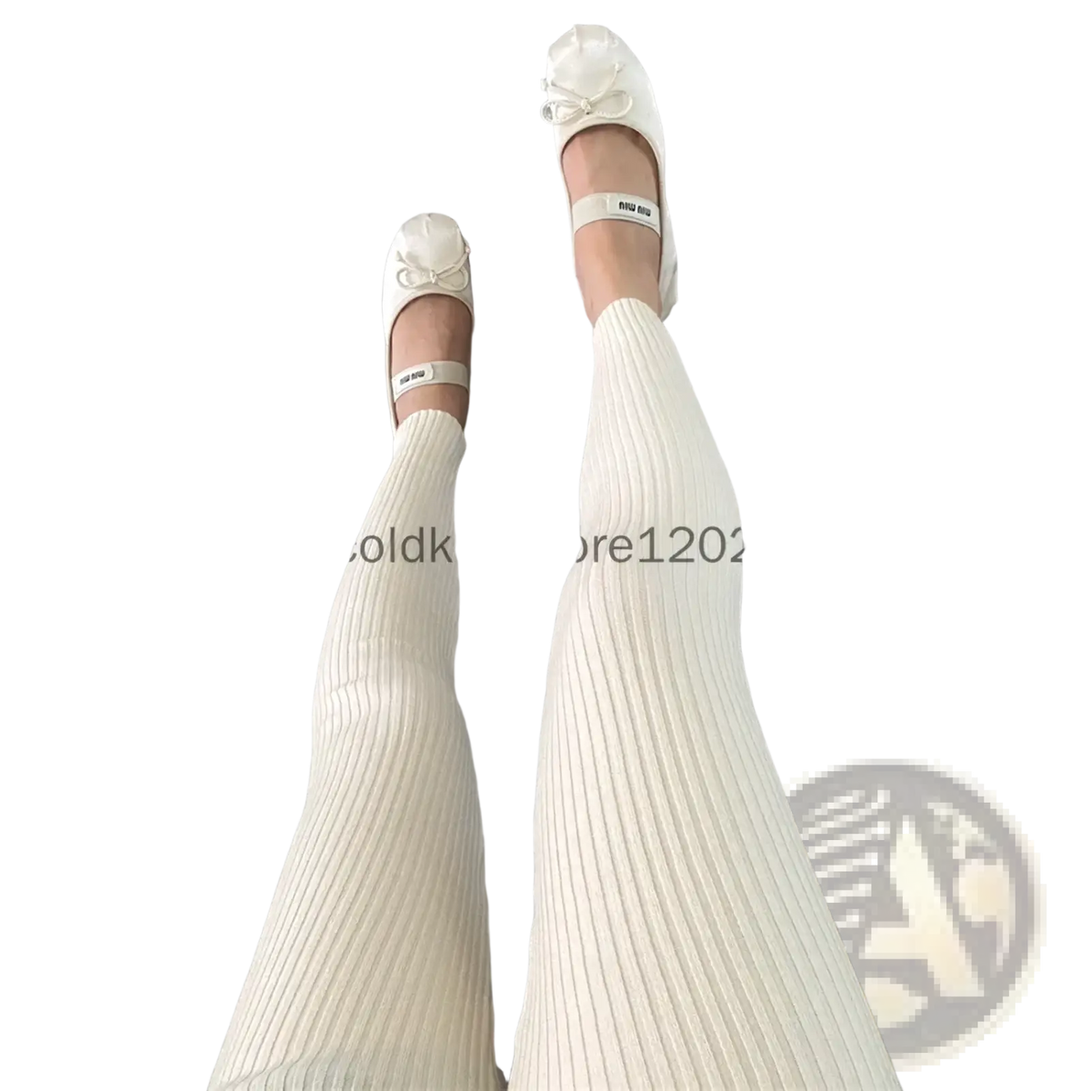 Cream-colored ribbed knit leggings high waist winter pants paired with white miu miu ballet flats featuring bow details