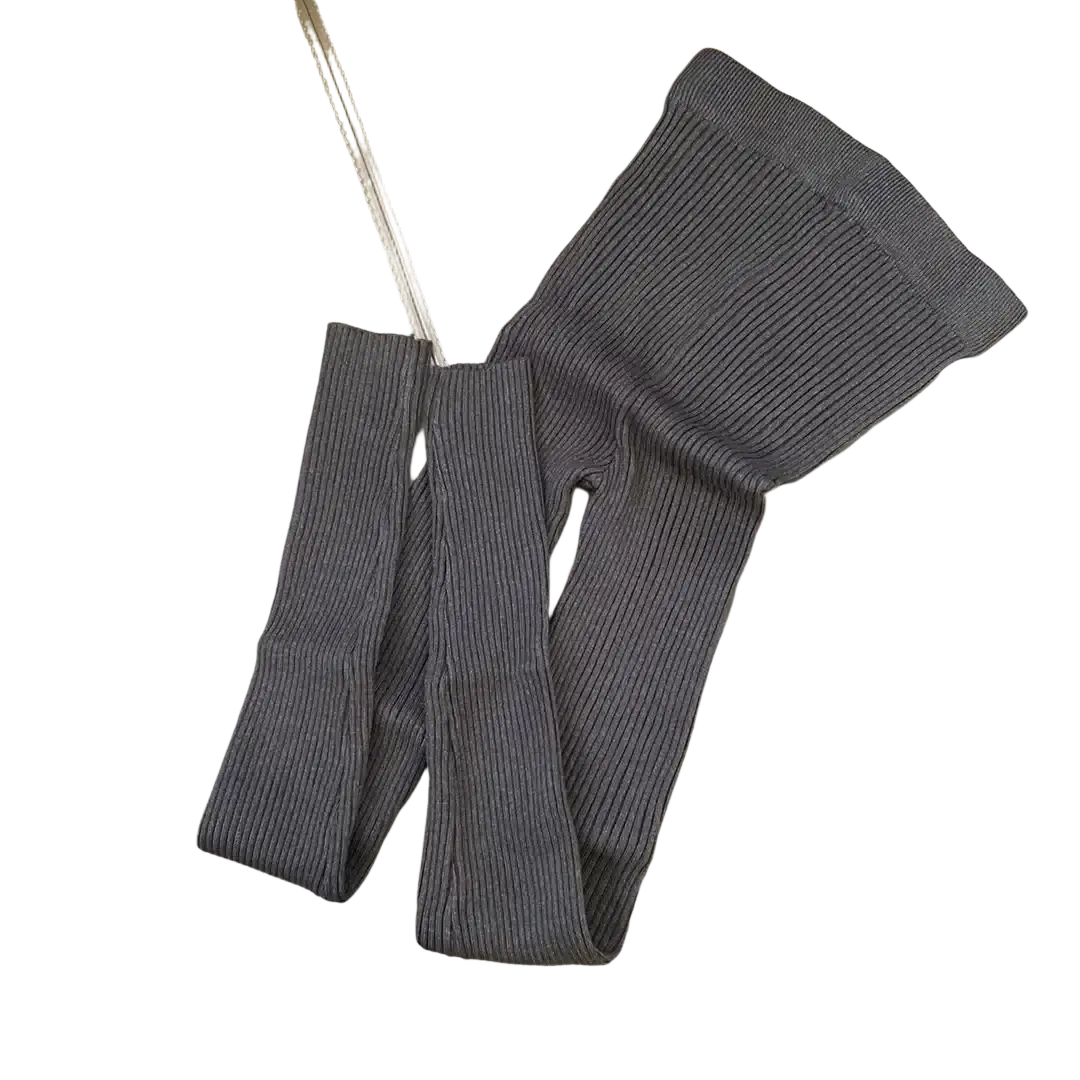 Gray ribbed knit leggings with a snug form-fitting design high waist perfect for winter wear