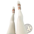 Cream-colored ribbed knit high waist winter leggings paired with white miu miu ballet flats with bow details