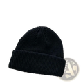 Black ribbed knit winter beanie hat with folded cuff made of warm yarn for unisex use in cold weather
