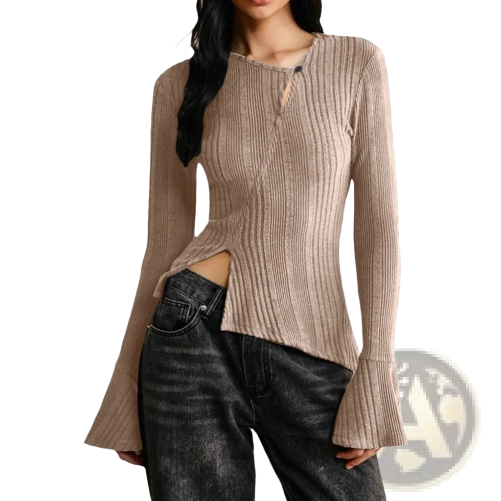 A ribbed beige long sleeve knit top with side slit and flared cuffs offering a stylish cutout design