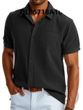 Black ribbed short sleeve button up shirt for men featuring a subtle vertical texture and lightweight fabric