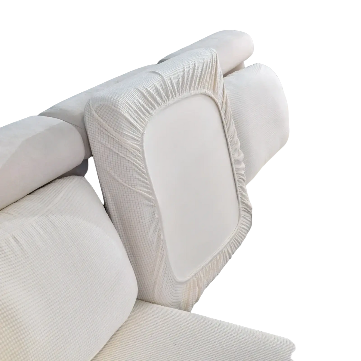 White ribbed stretch sofa cushion slipcover protector with textured fabric, elasticated edges, and ruffled trim