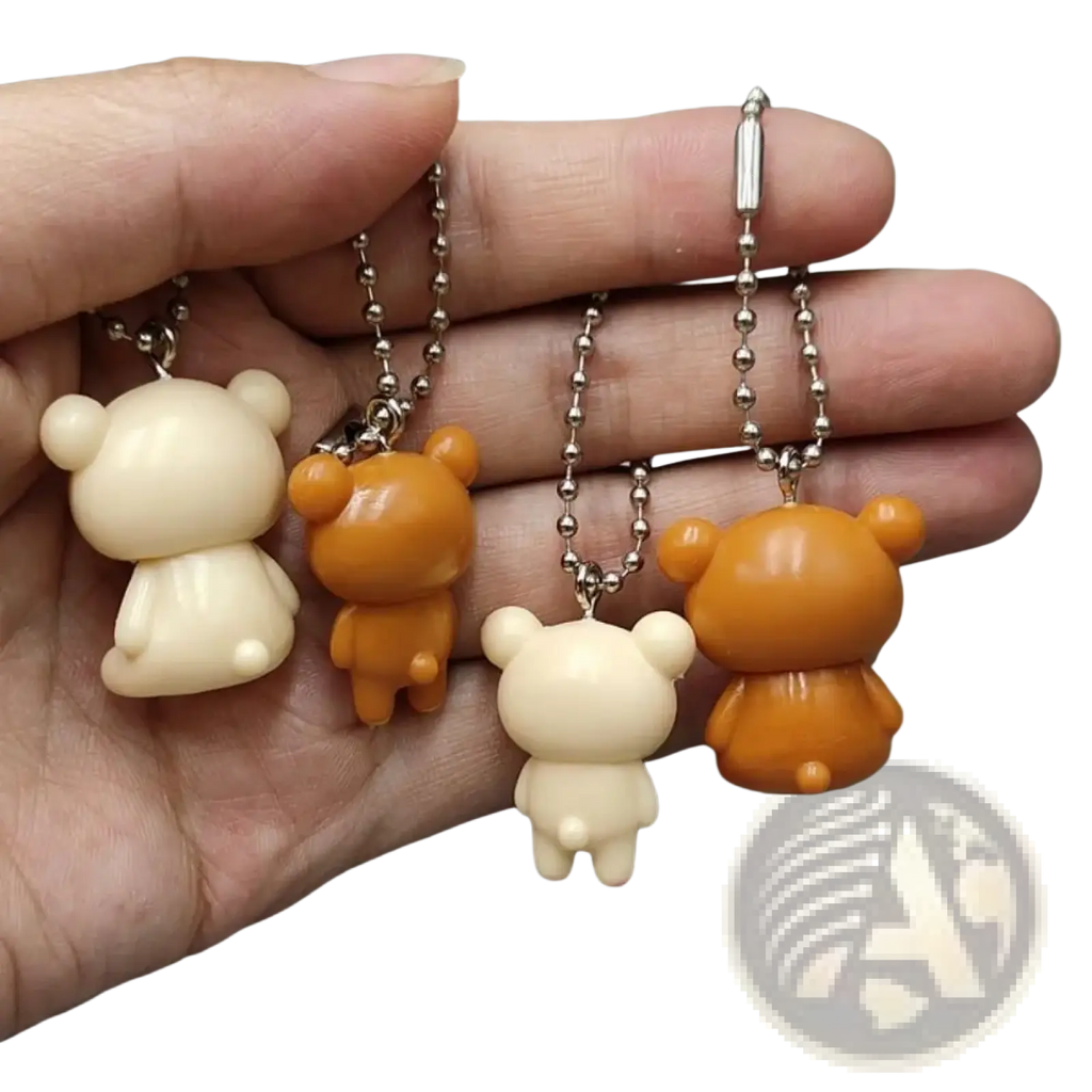 Rilakkuma bear keychain cute diy pendant with beige and orange smooth plastic bodies and silver ball chains
