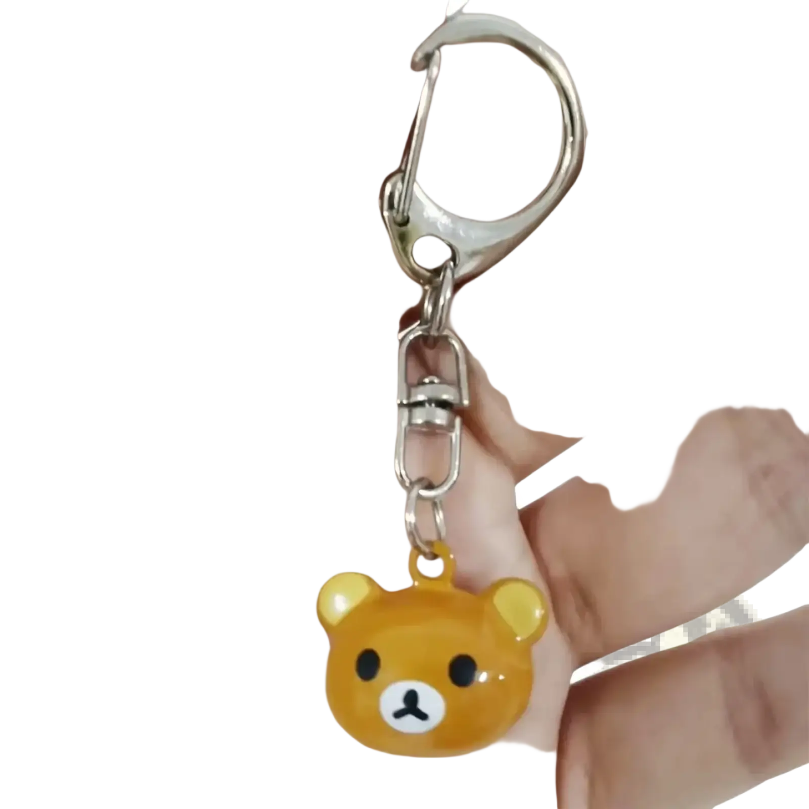 A shiny translucent orange bear-shaped enamel charm keychain with black eyes and a white nose from Rilakkuma set