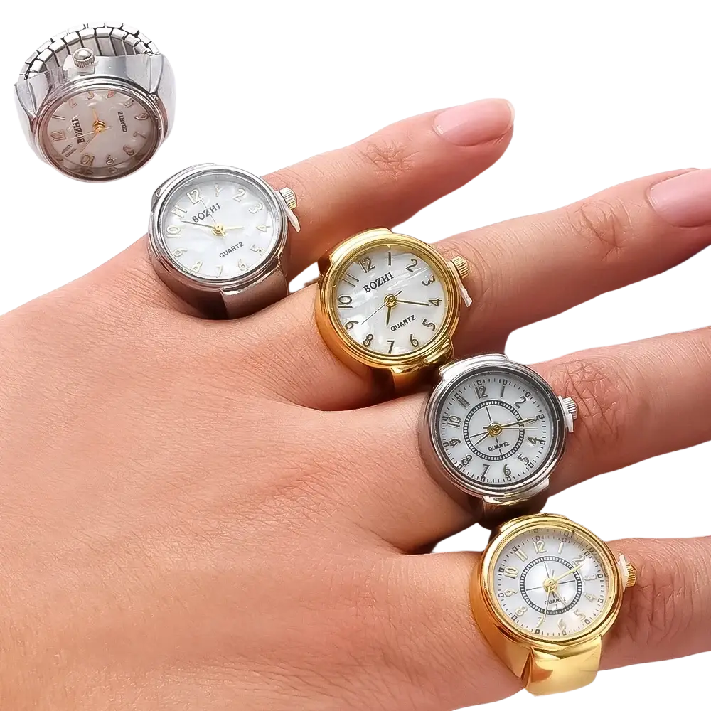 A hand wearing five miniature ring watches with silver and gold-tone cases and white dials with black numerals