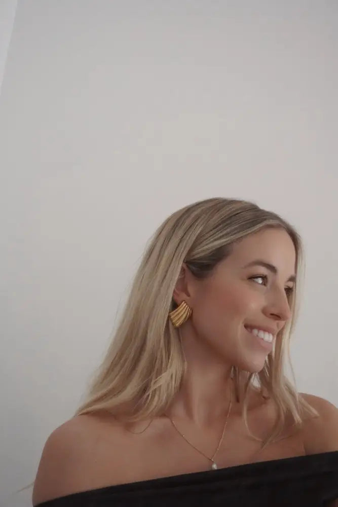 18k gold plated ripple fan hoop earrings featuring a gold-toned fan-shaped ear cuff with sleek modern design