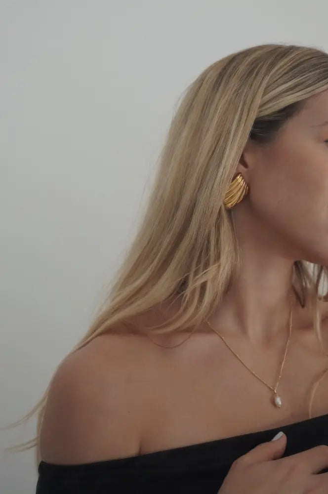 18k gold plated ripple fan hoop earrings in gold tone with a textured shell shaped ear cuff design