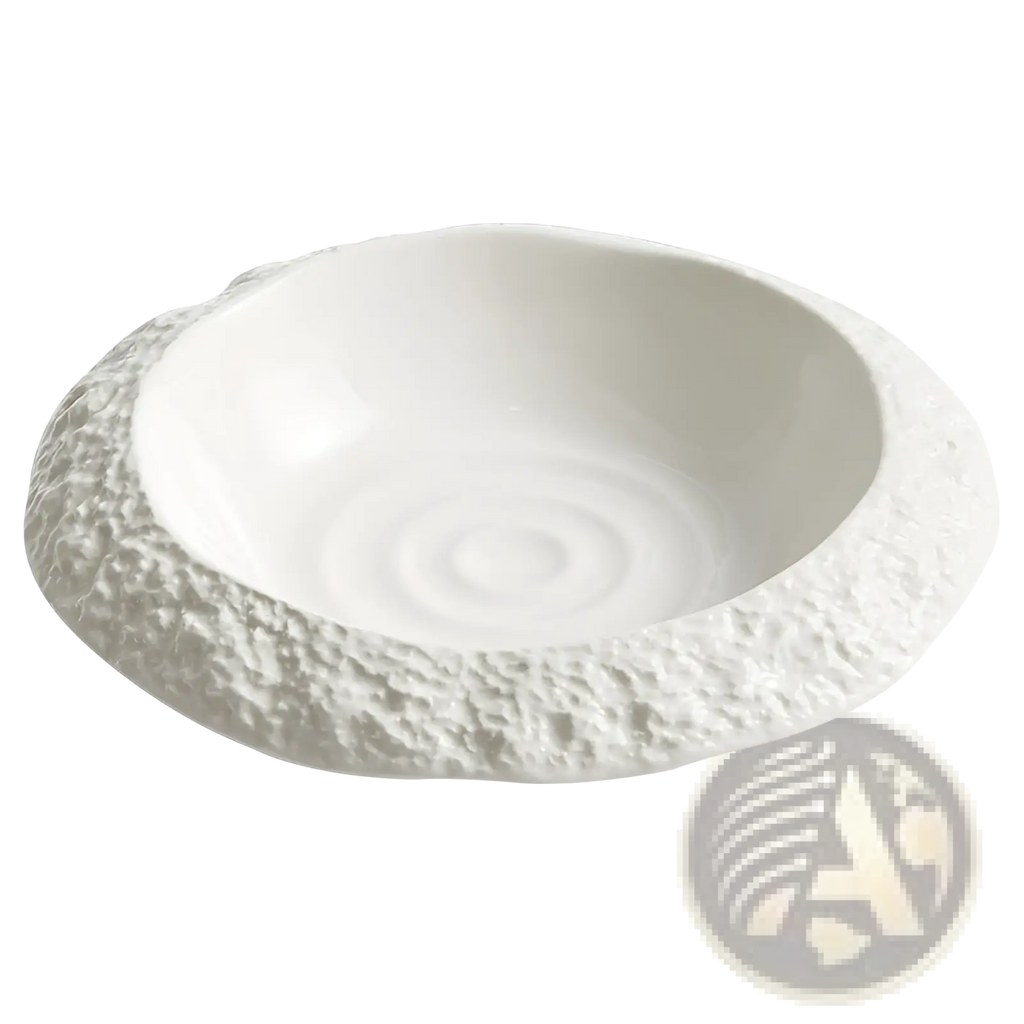 White ceramic deep plate with rough textured exterior and smooth subtly ridged interior in modern rock pattern design