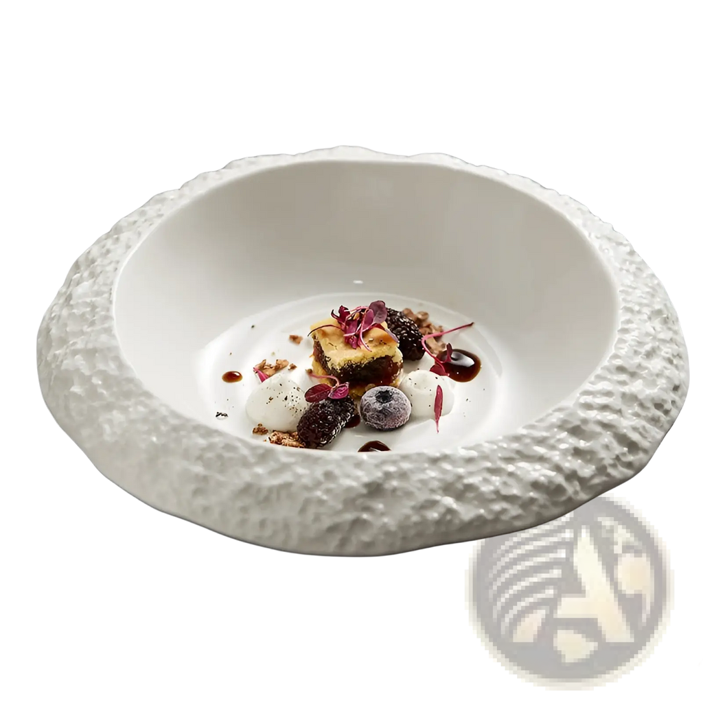 White ceramic deep bowl with a textured bumpy rim and smooth interior in a modern rock pattern design