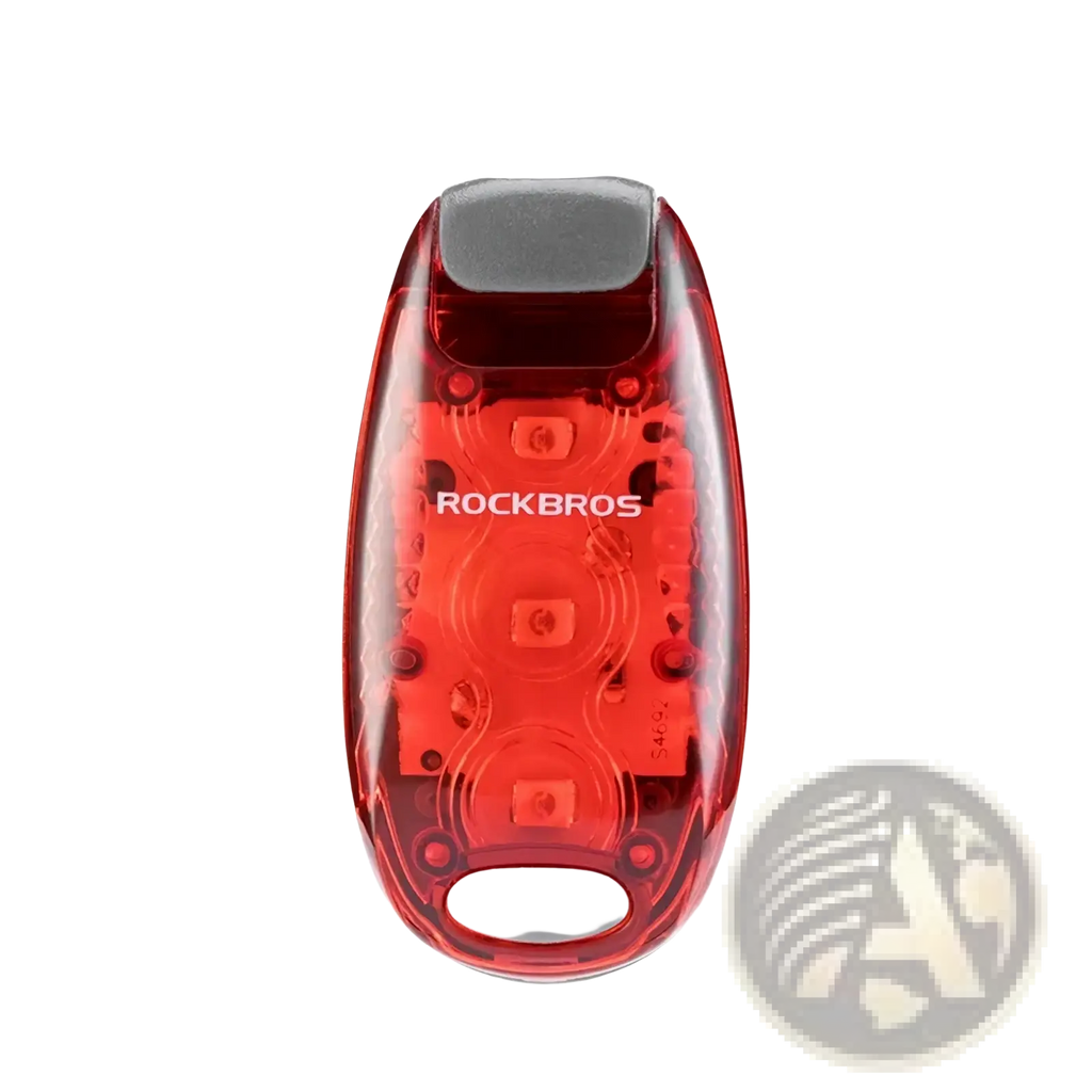 Red translucent plastic Rockbros bike tail light with gray clip and button rechargeable led rear lamp backside view