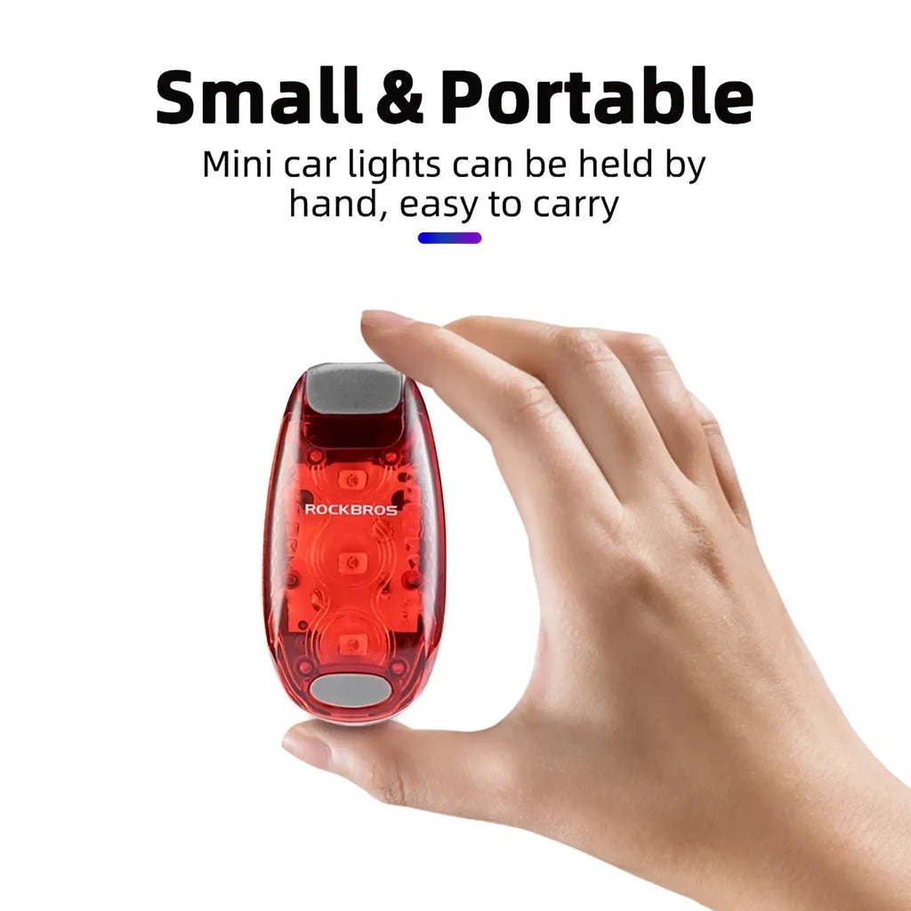 Red translucent plastic rockbros rechargeable led bike tail light with gray accents showing back side details