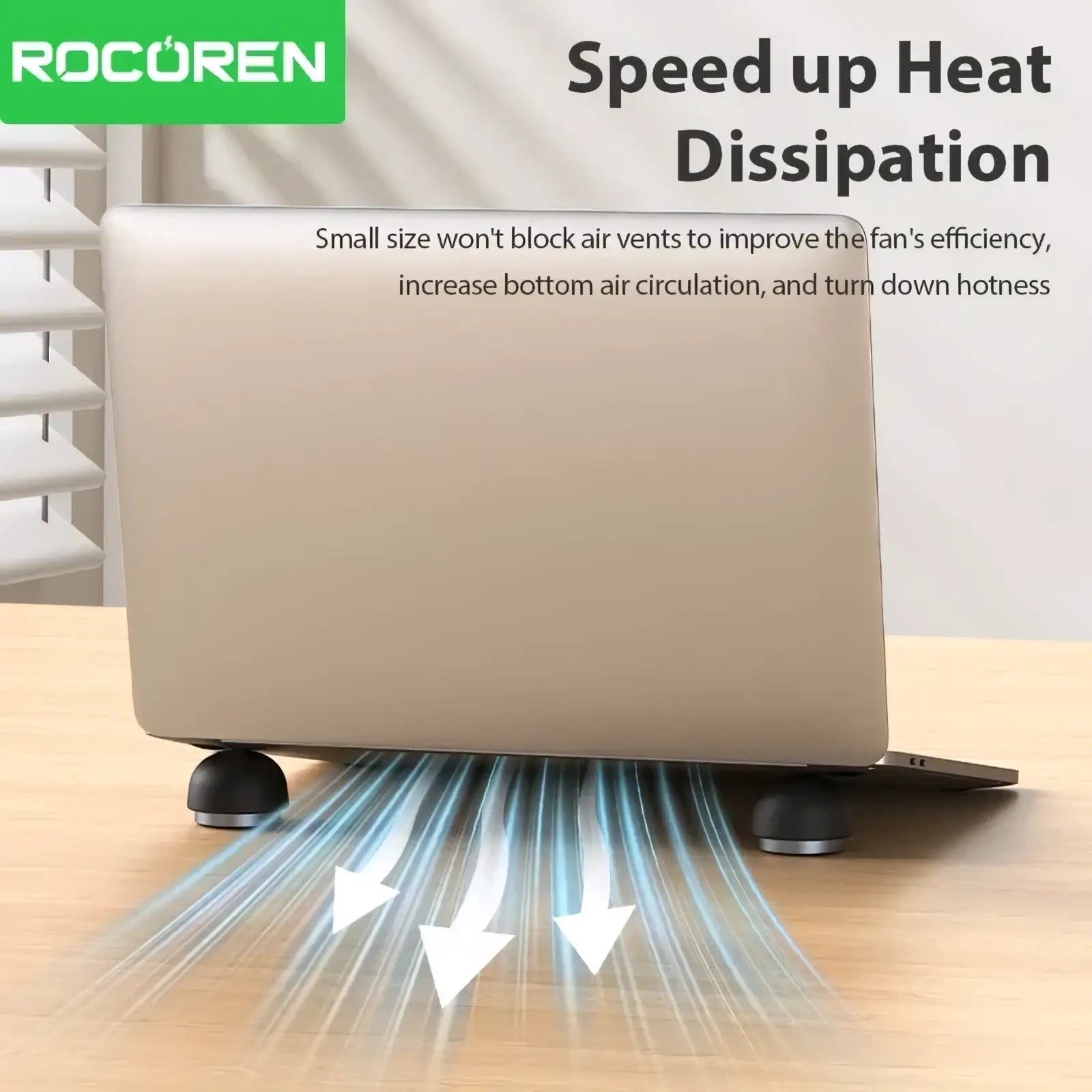 Silver Rocoren magnetic laptop stand and cooling holder with black circular feet and sleek minimalist design