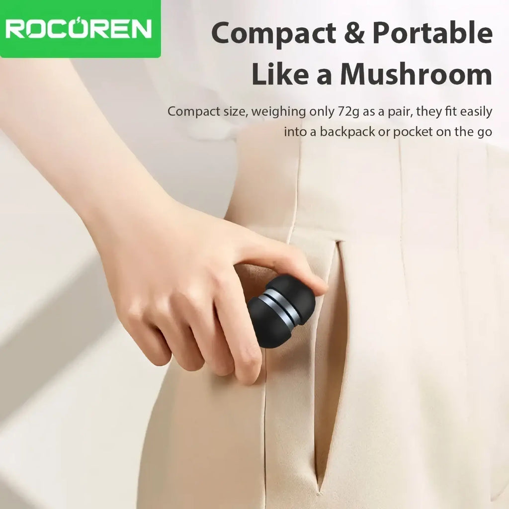 Black and silver rocoren compact portable mushroom-shaped massage gun with sleek metallic accents for muscle relief