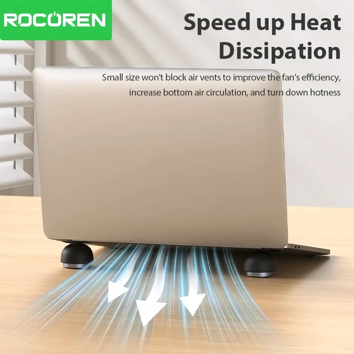 Silver Rocoren magnetic laptop stand and cooling holder with black circular feet and sleek minimalist design
