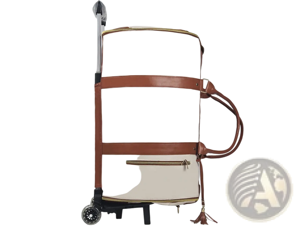 Cream-colored rolling travel bag with brown leather straps and tassel accent foldable large capacity duffel