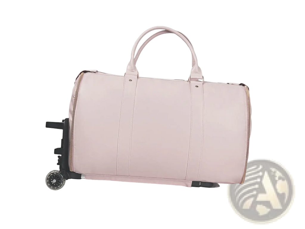 A sleek blush pink rolling travel bag with smooth synthetic leather finish and sturdy top handles for fitness use