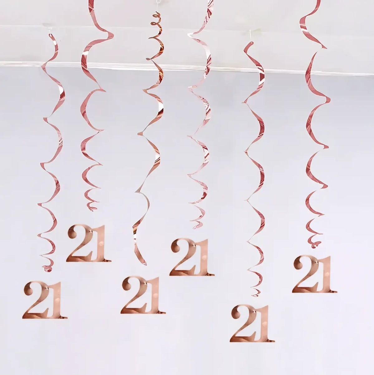 Rose gold metallic spiral streamers with number 21 cutouts for birthday swirl decorations assorted ages