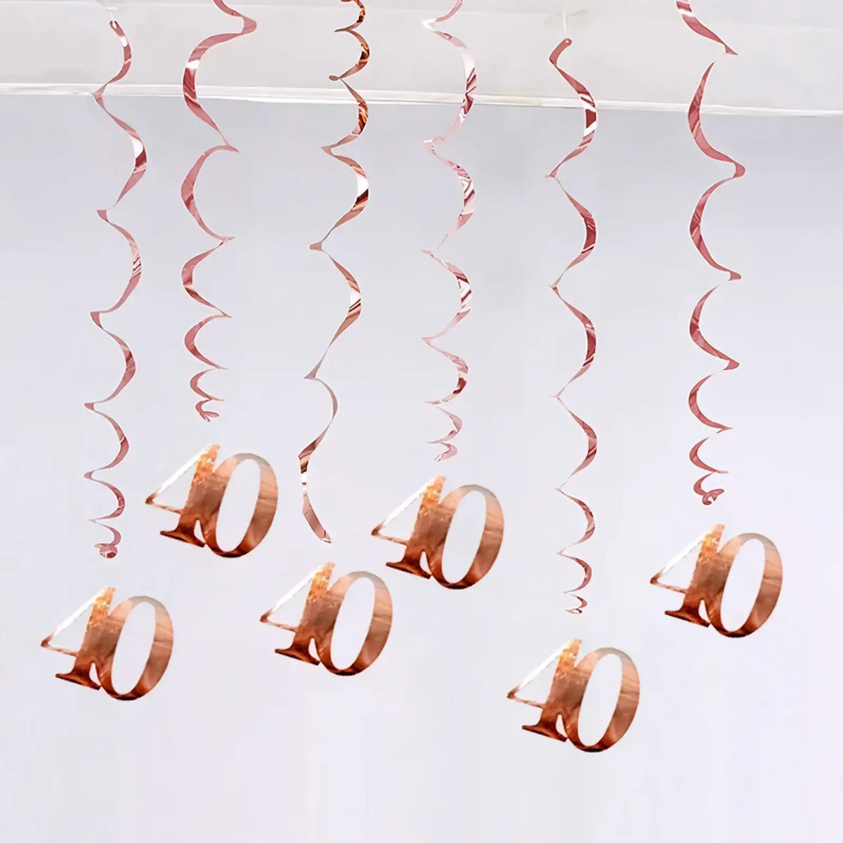 Rose gold metallic spiral streamers with hanging 40 numerals for birthday swirl decorations assorted ages