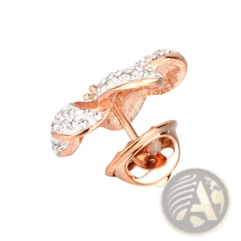 Rose gold crystal lapel pin suit brooch featuring a twisted bow design with clear crystals in rose gold tone