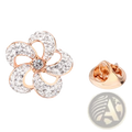 Rose gold flower-shaped lapel pin adorned with clear crystals ideal as a suit brooch accessory