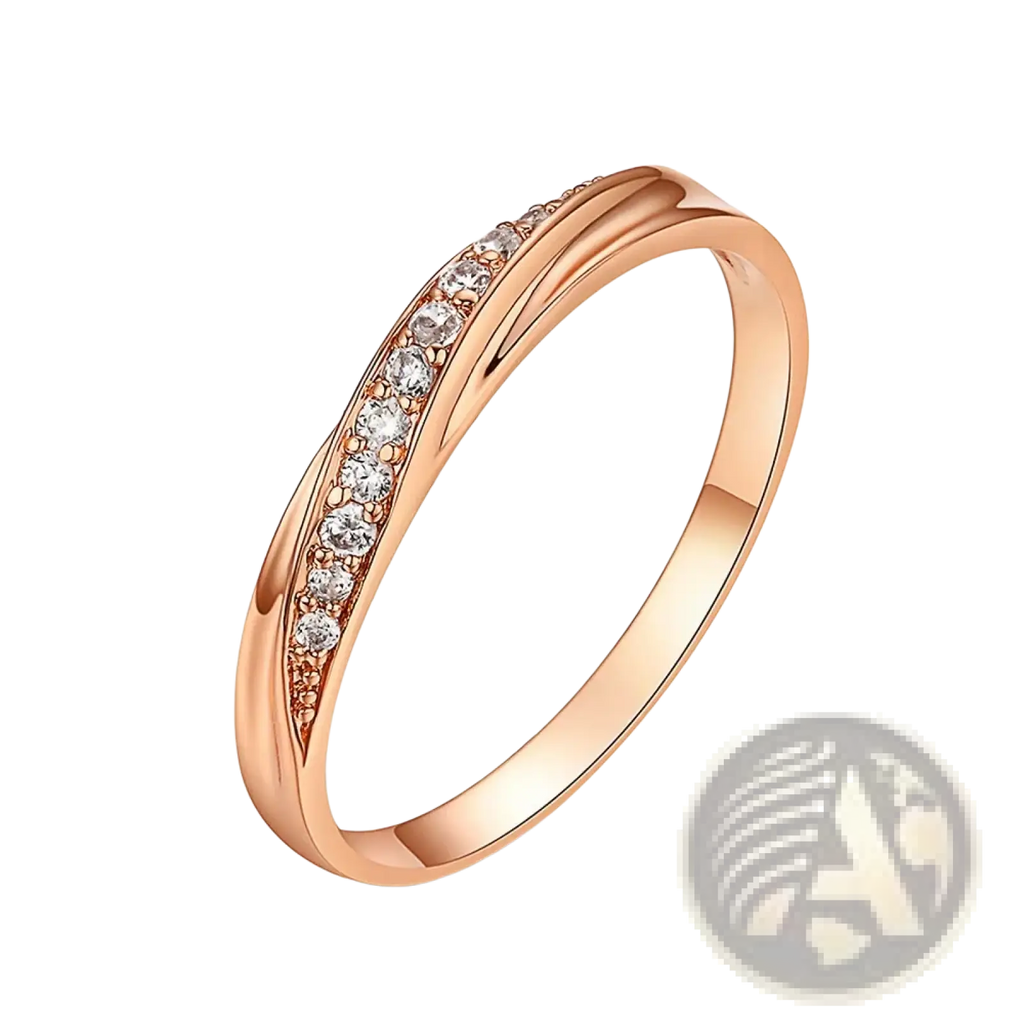 Rose gold cubic zirconia dainty wedding ring with sleek intertwined band and clear stones on front side