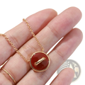 Rose gold double sided button necklace sterling silver with a delicate gold chain and polished red carnelian pendant