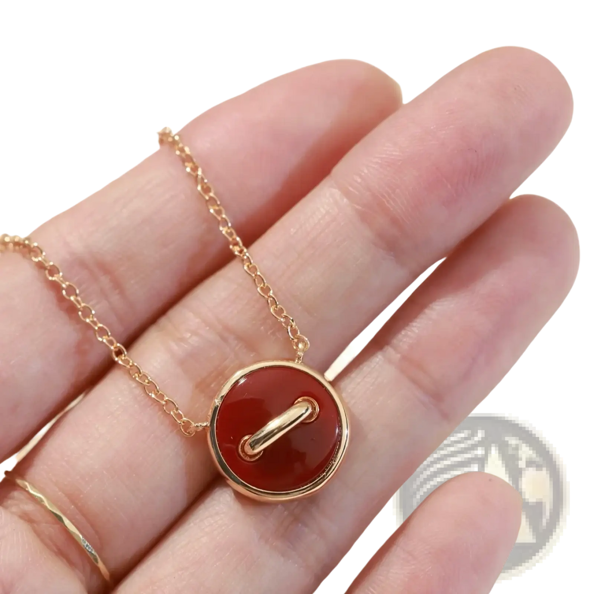 Rose gold double sided button necklace sterling silver with a delicate gold chain and polished red carnelian pendant