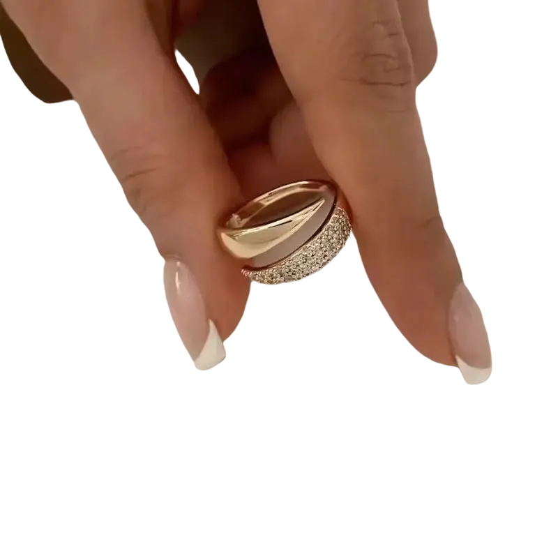 Rose gold interlocking diamond ring for women with sleek modern design featuring smooth and pavé diamond bands