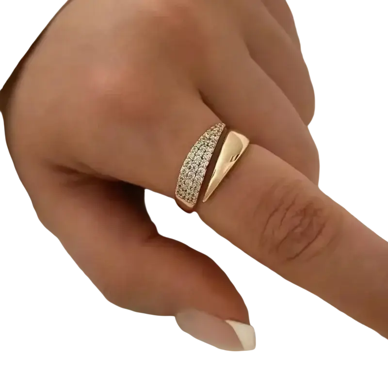 Rose gold interlocking diamond ring for women with two bands one featuring clear stones and the other smooth polished
