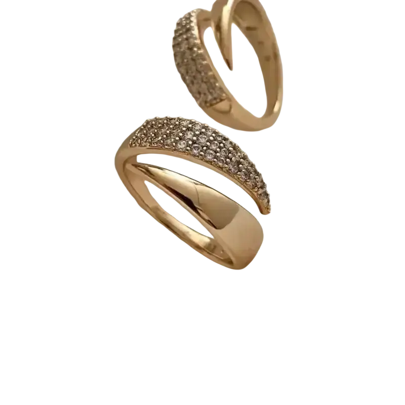 Rose gold interlocking diamond ring for women with gold-toned bands featuring rows of sparkling clear crystals