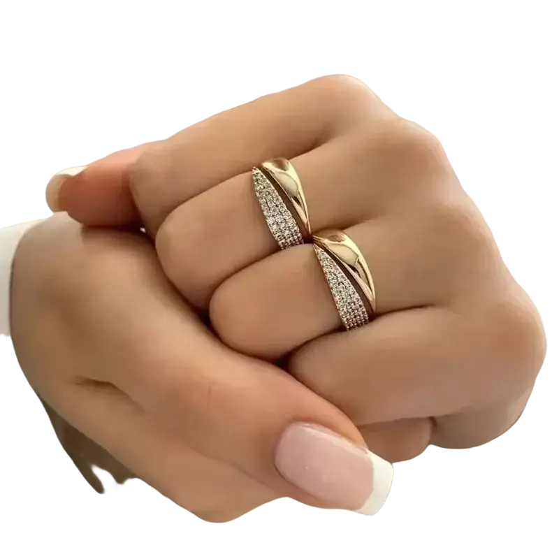 Rose gold interlocking diamond ring for women with gold-toned sleek intertwined design and embedded sparkling stones