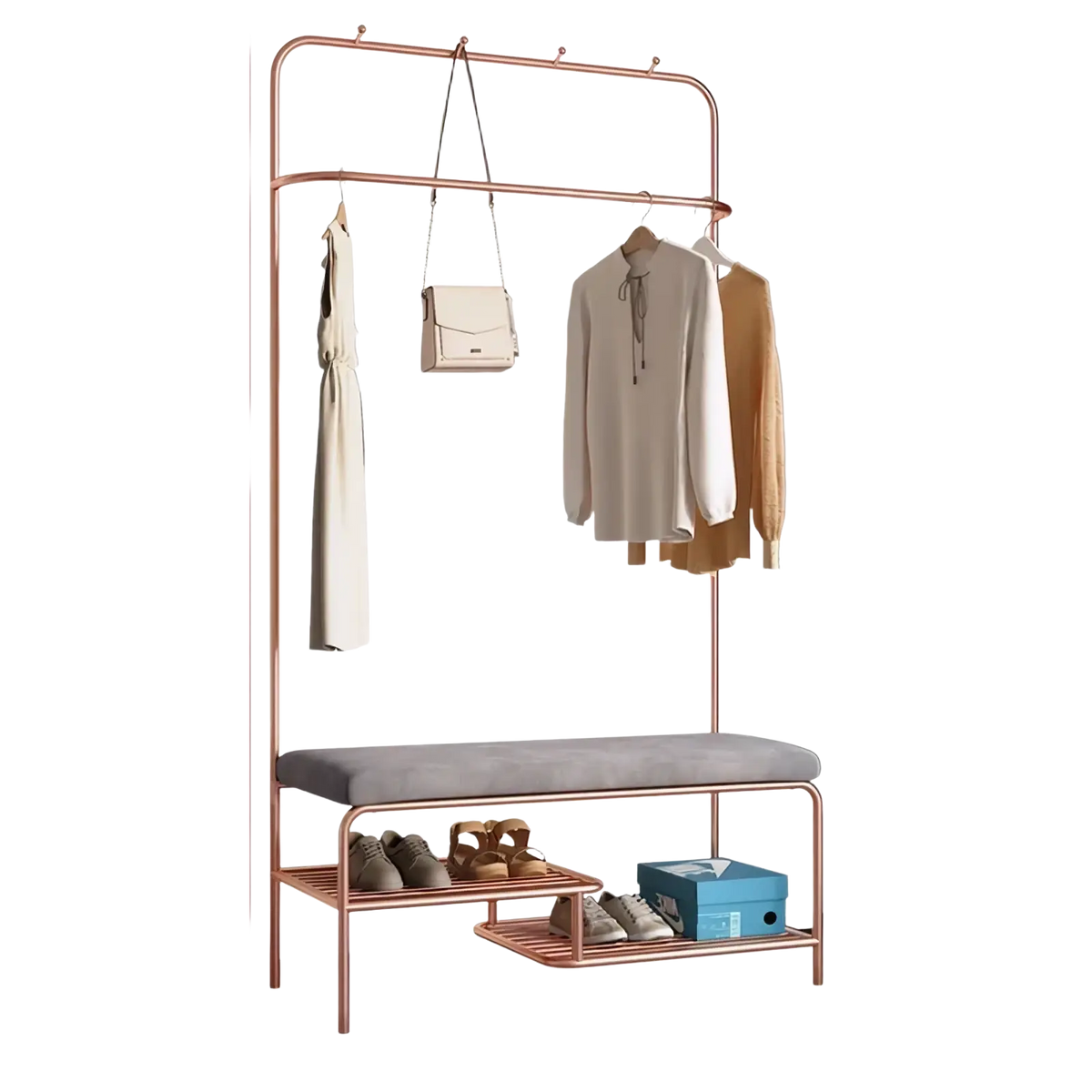 Rose gold metal kids clothes rack with gray upholstered bench and two lower shelves for organized storage