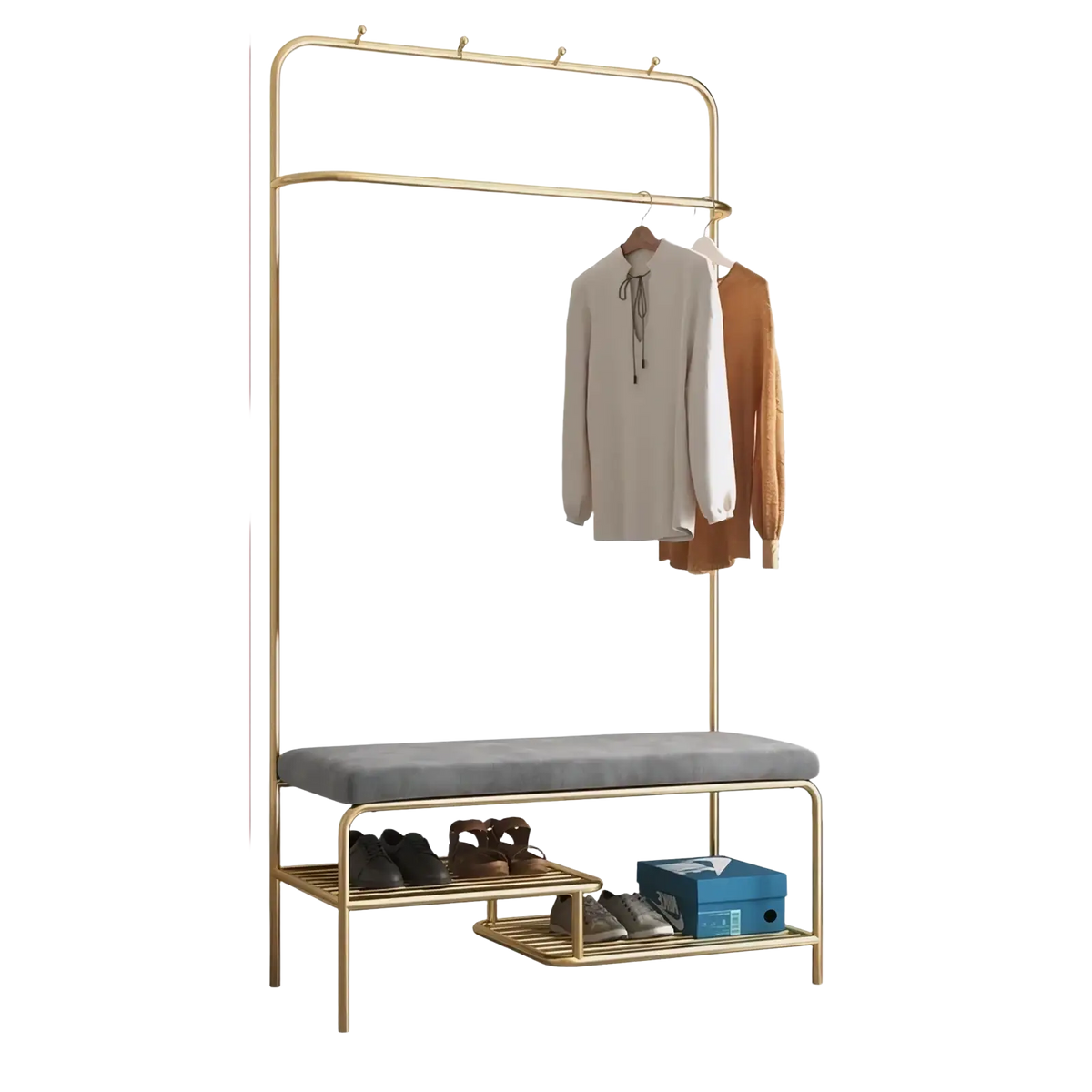 Rose gold kids clothes rack with gold metal coat rack, gray upholstered bench, and two lower shelves for storage