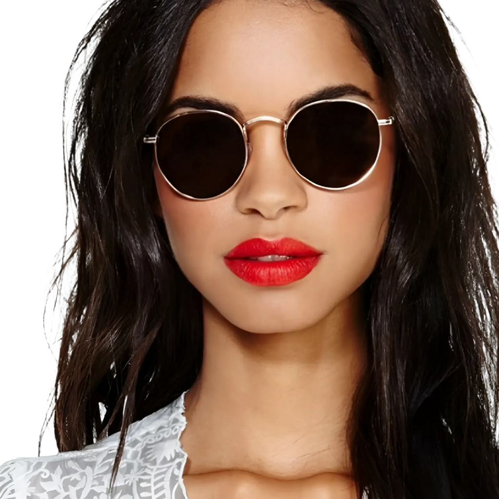 Round dark-tinted sunglasses with a thin metallic frame from the rose gold and metallic aviator mirror lens set