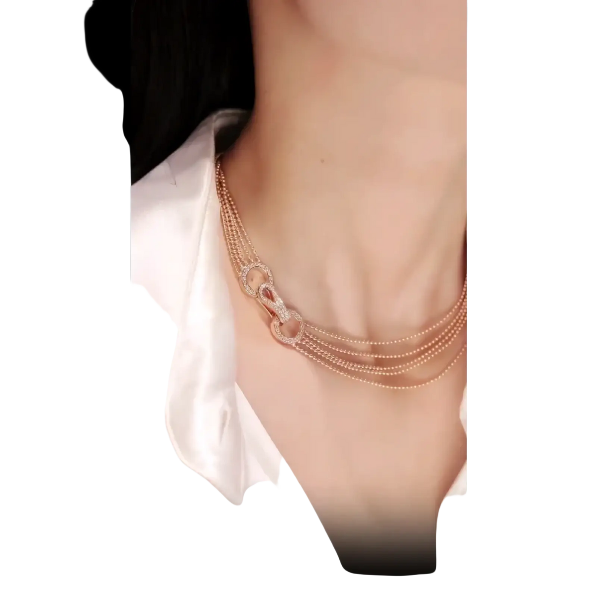 Rose gold multi strand zircon necklace with delicate thin chains and a central diamond encrusted clasp design