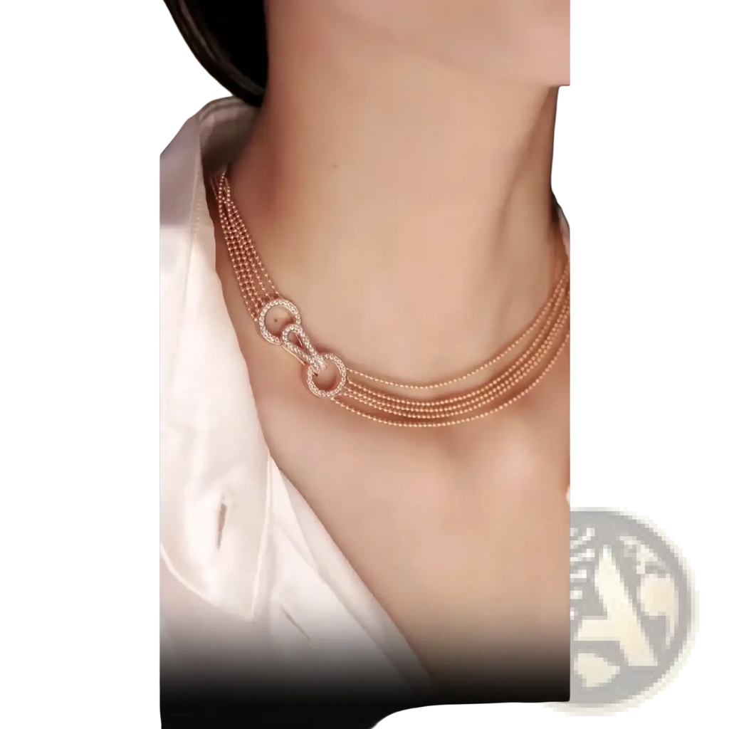 Rose gold multi strand zircon necklace featuring delicate beaded chains and a central diamond encrusted clasp