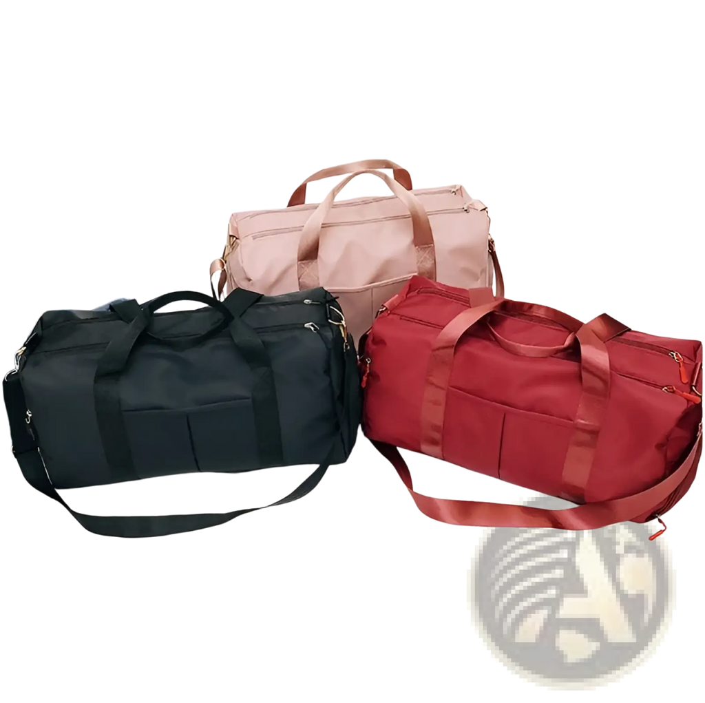 Three nylon waterproof sports duffel bags in black pink and red with fabric handles and adjustable shoulder straps