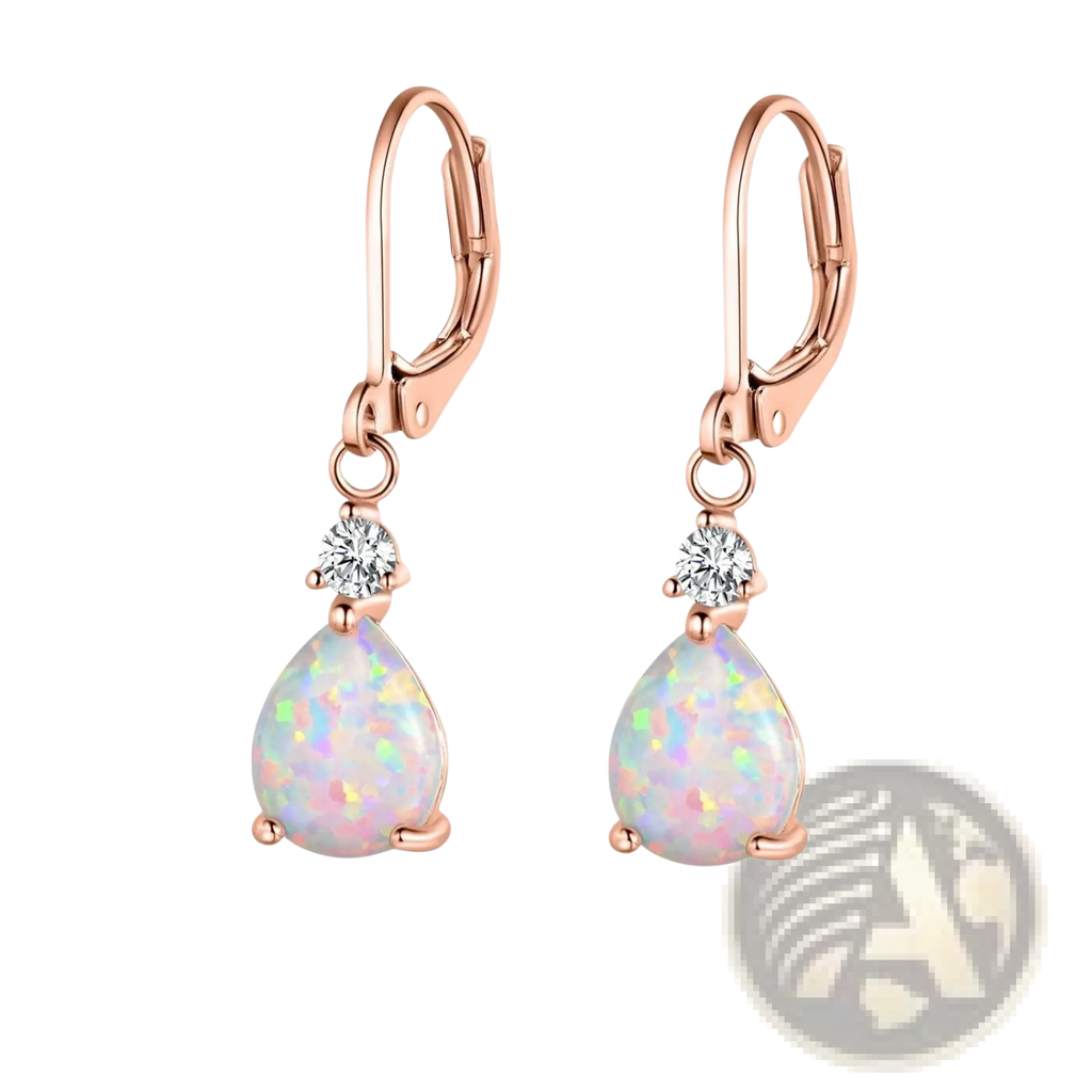 Rose gold opal teardrop earrings featuring diamond accents with a round diamond above each opal stone