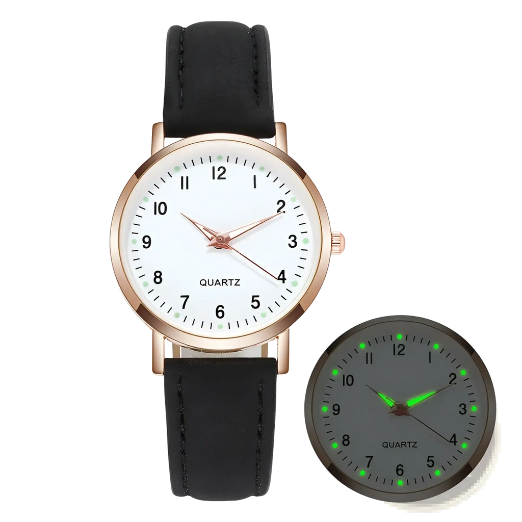 Rose gold women leather quartz watch with black leather strap white face and glowing green dial in low light