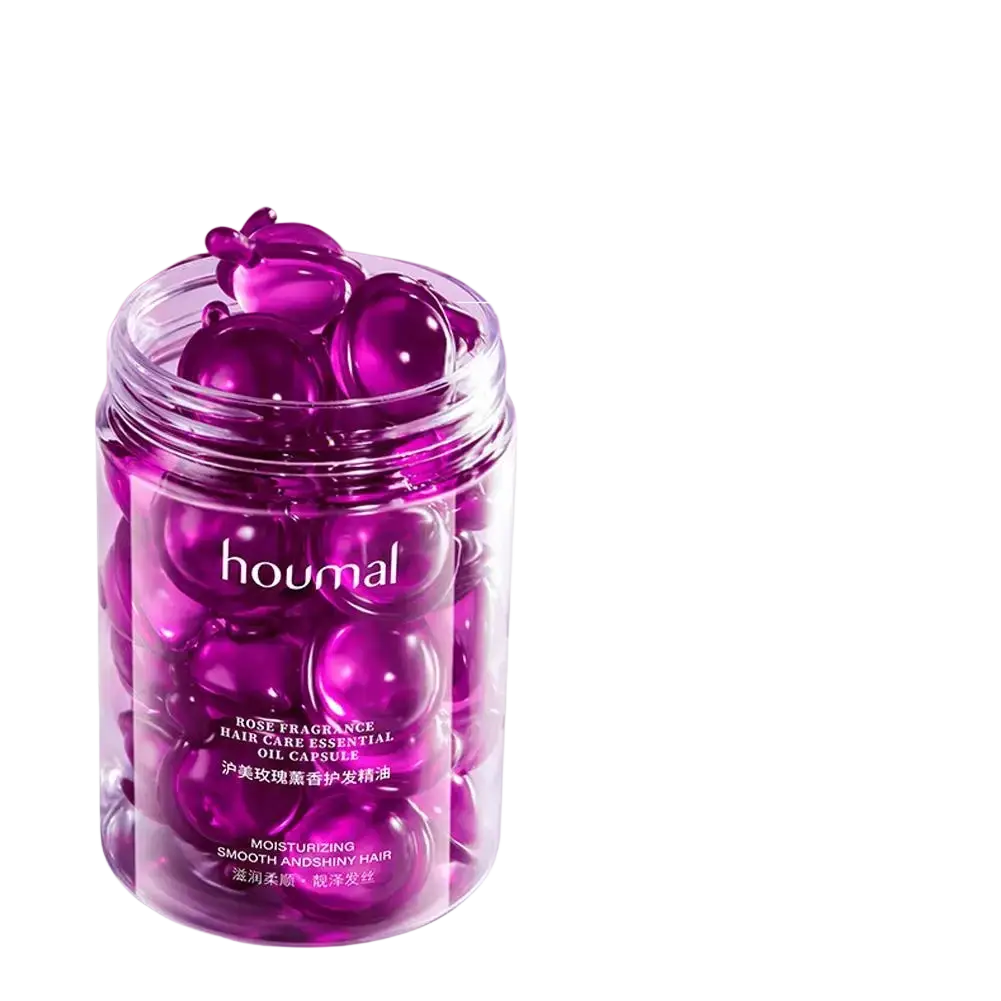 A clear glass jar of vibrant purple glossy oil capsules labeled houmal rose fragrance for frizzy hair care