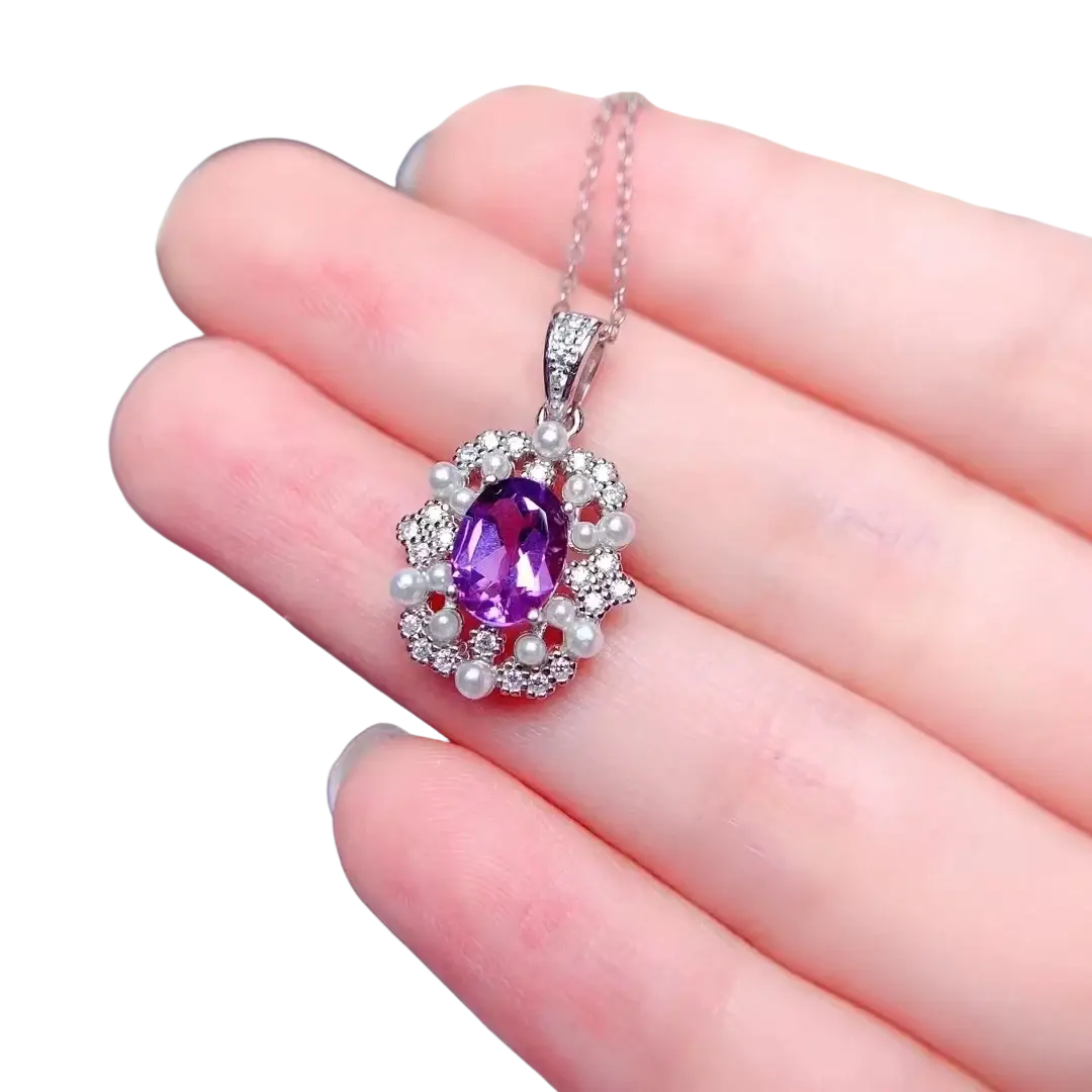 Rose quartz sterling silver jewelry set with a delicate silver pendant featuring amethyst, diamonds, and white pearls
