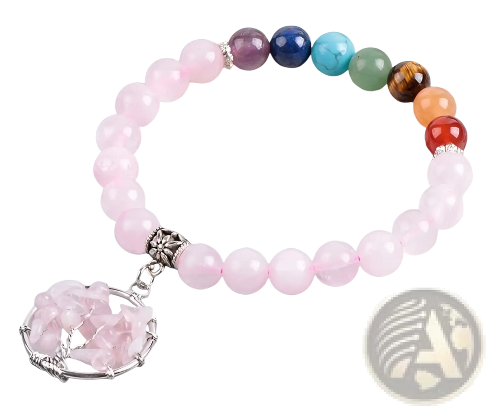 A delicate pink rose quartz bracelet with a tree of life charm and seven chakra-colored beads accented in silver